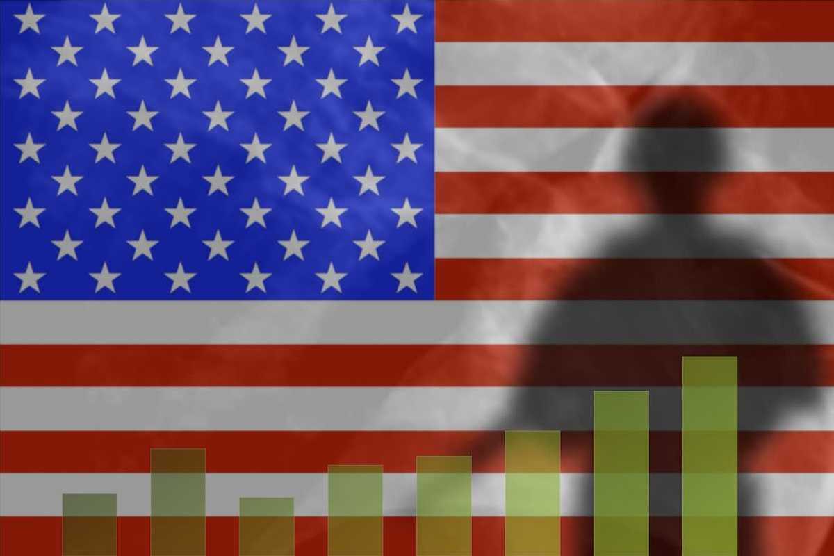 The shadow of a soldier on the background of the American flag. Graph depicts military spending growth chart.