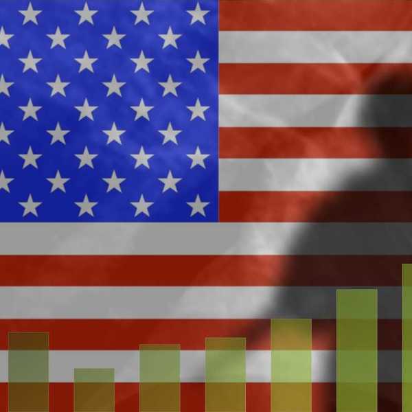 The shadow of a soldier on the background of the American flag. Graph depicts military spending growth chart.