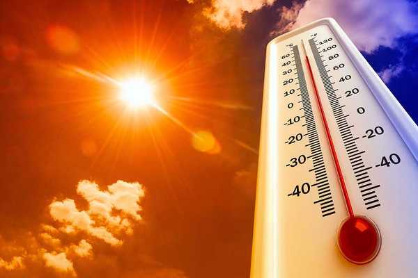 Thermometer with 100 degree reading superimposed against a scorching sunshiney sky