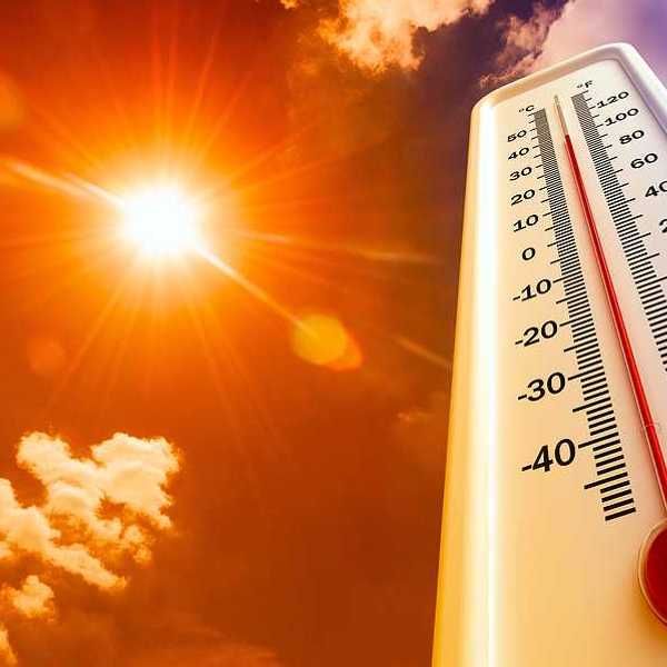 Thermometer with 100 degree reading superimposed against a scorching sunshiney sky