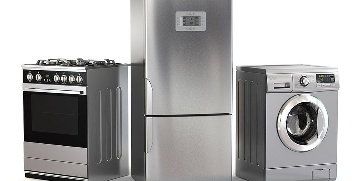 Three appliances: stove, refrigerator and washing machine.