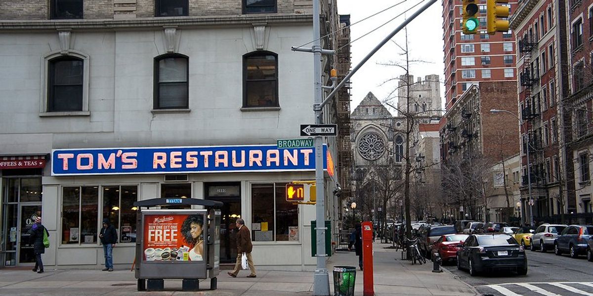 Tom's Restaurant sign on a corner diner on Broadway in New York City.