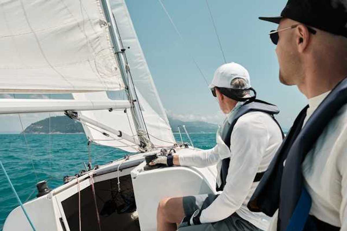 Two men on a sailboat