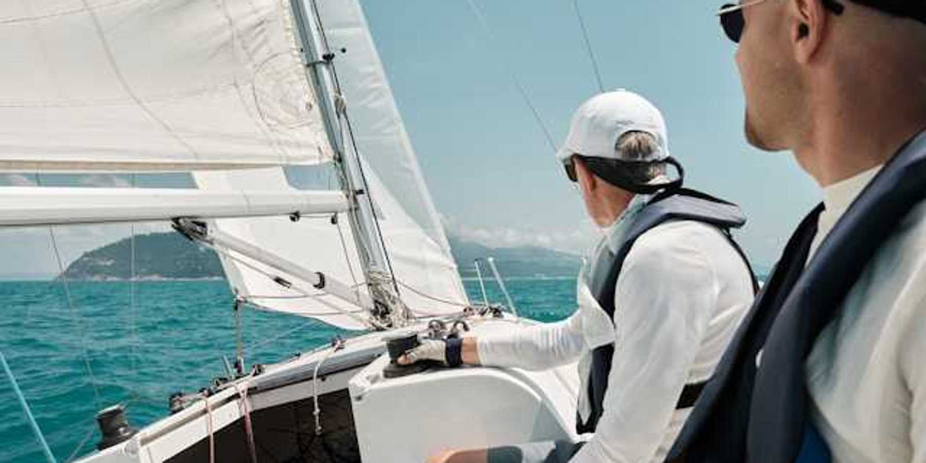 Two men on a sailboat