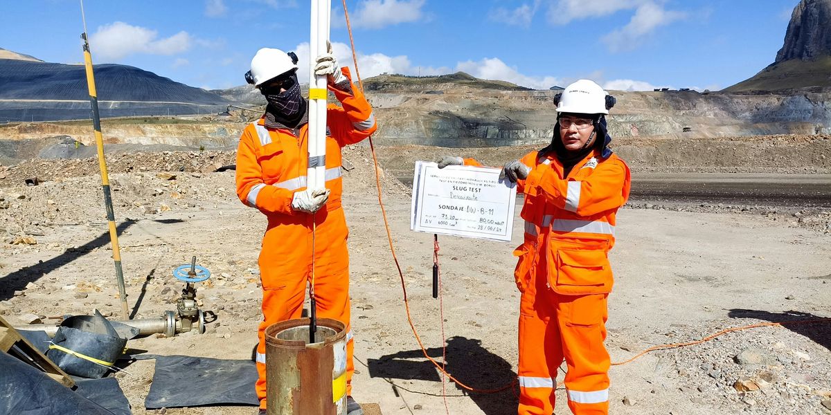 two workers near a mine