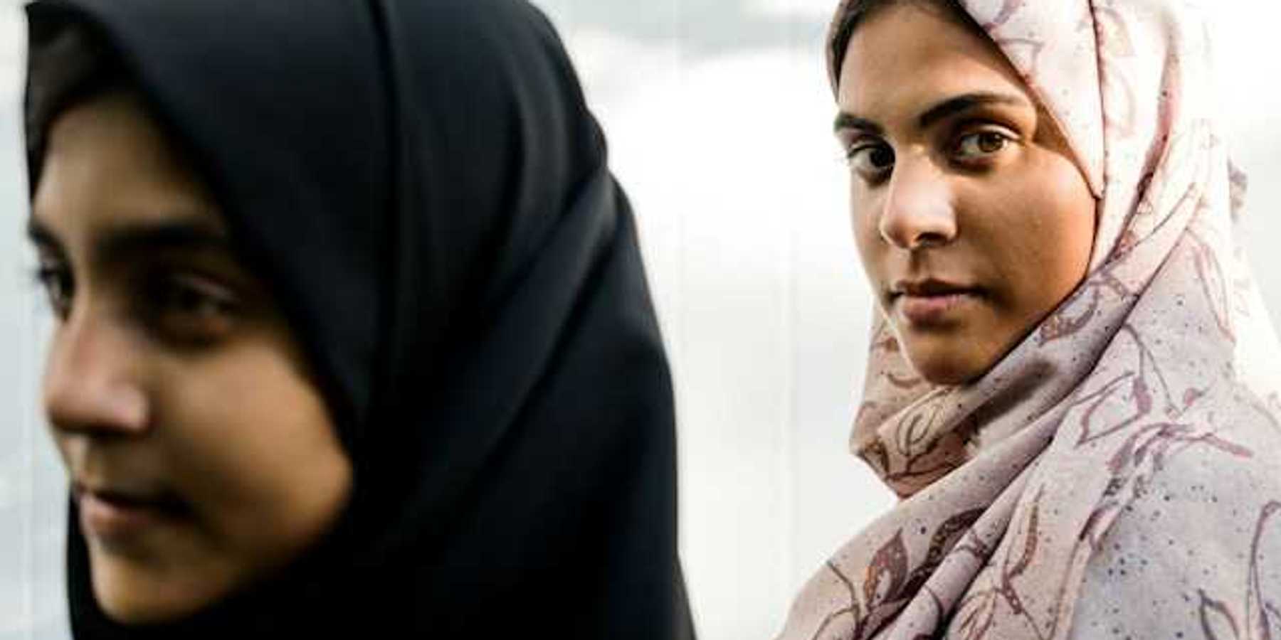 Two young women wearing hijab