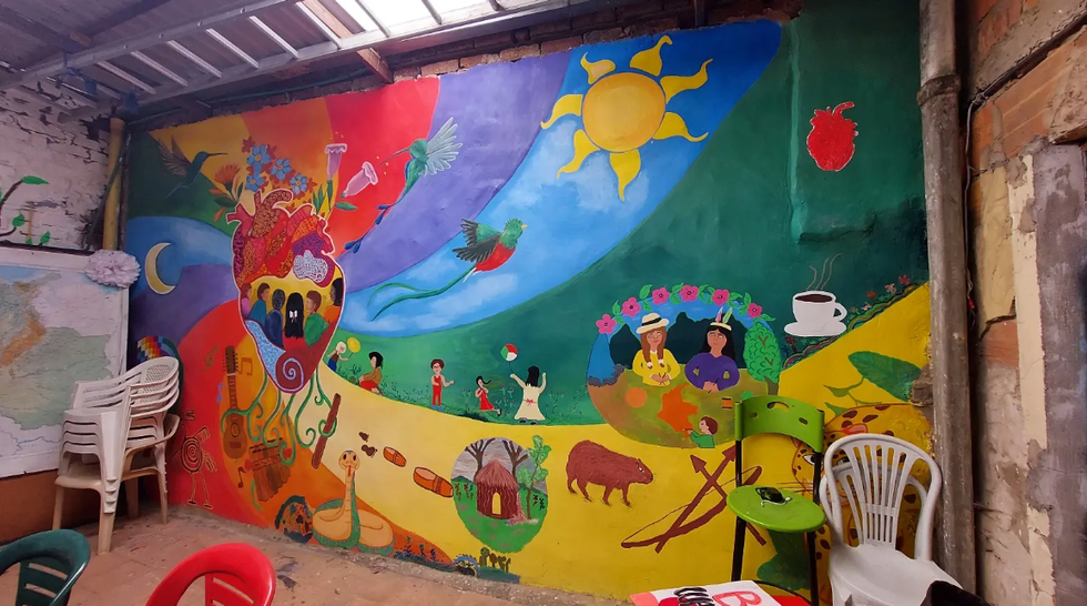 \u200bA mural painted by human rights and environmental activists and their children in the Corporaci\u00f3n Claretiana safe house south of Bogot\u00e1.