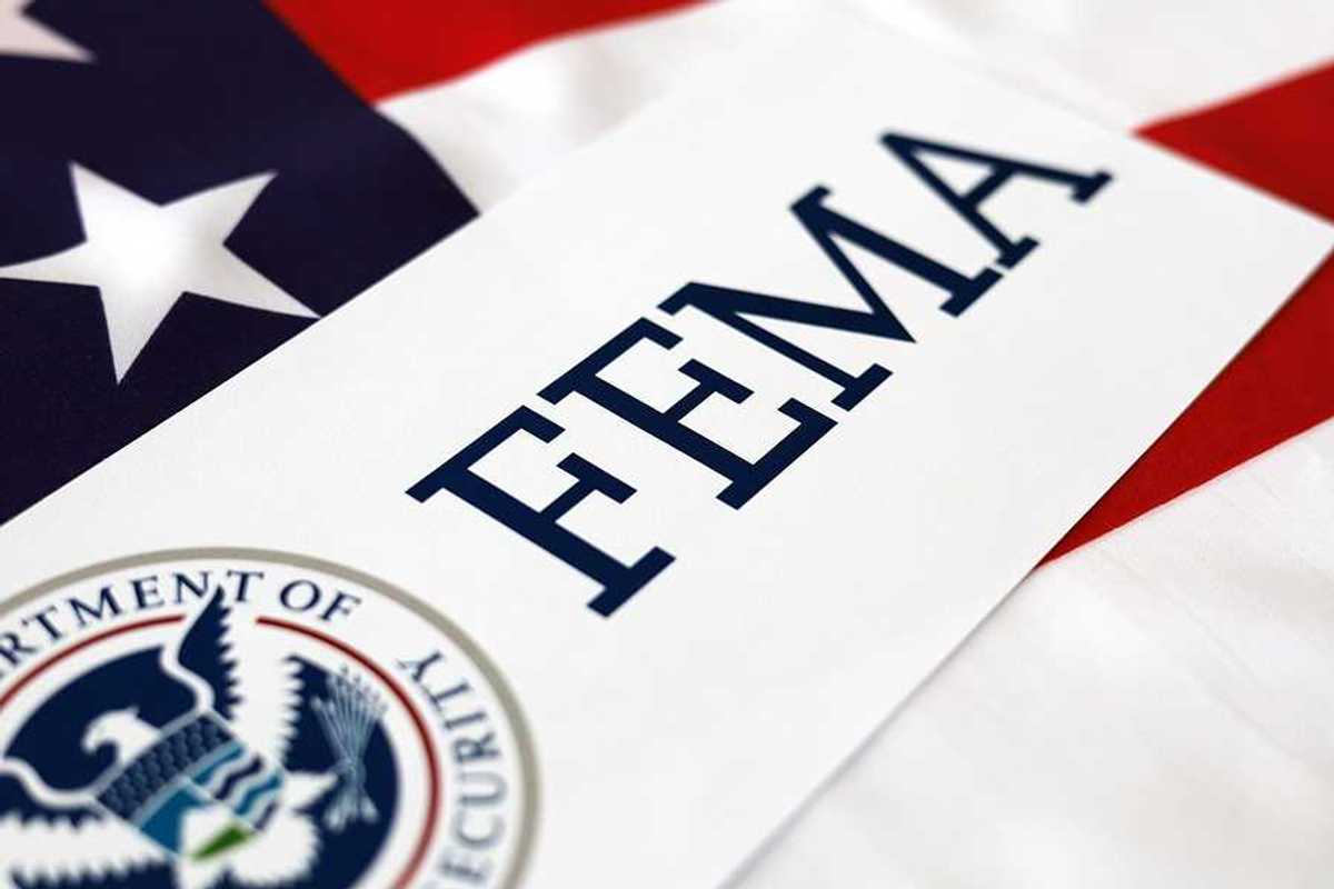 United State of America flag overlayed with FEMA logo and DHS seal