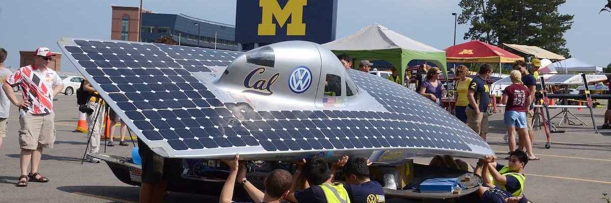 University of California Berkeley's solar car team members recharging their car at the American Solar Challenge stop July 16 2012 in Ann Arbor MI.