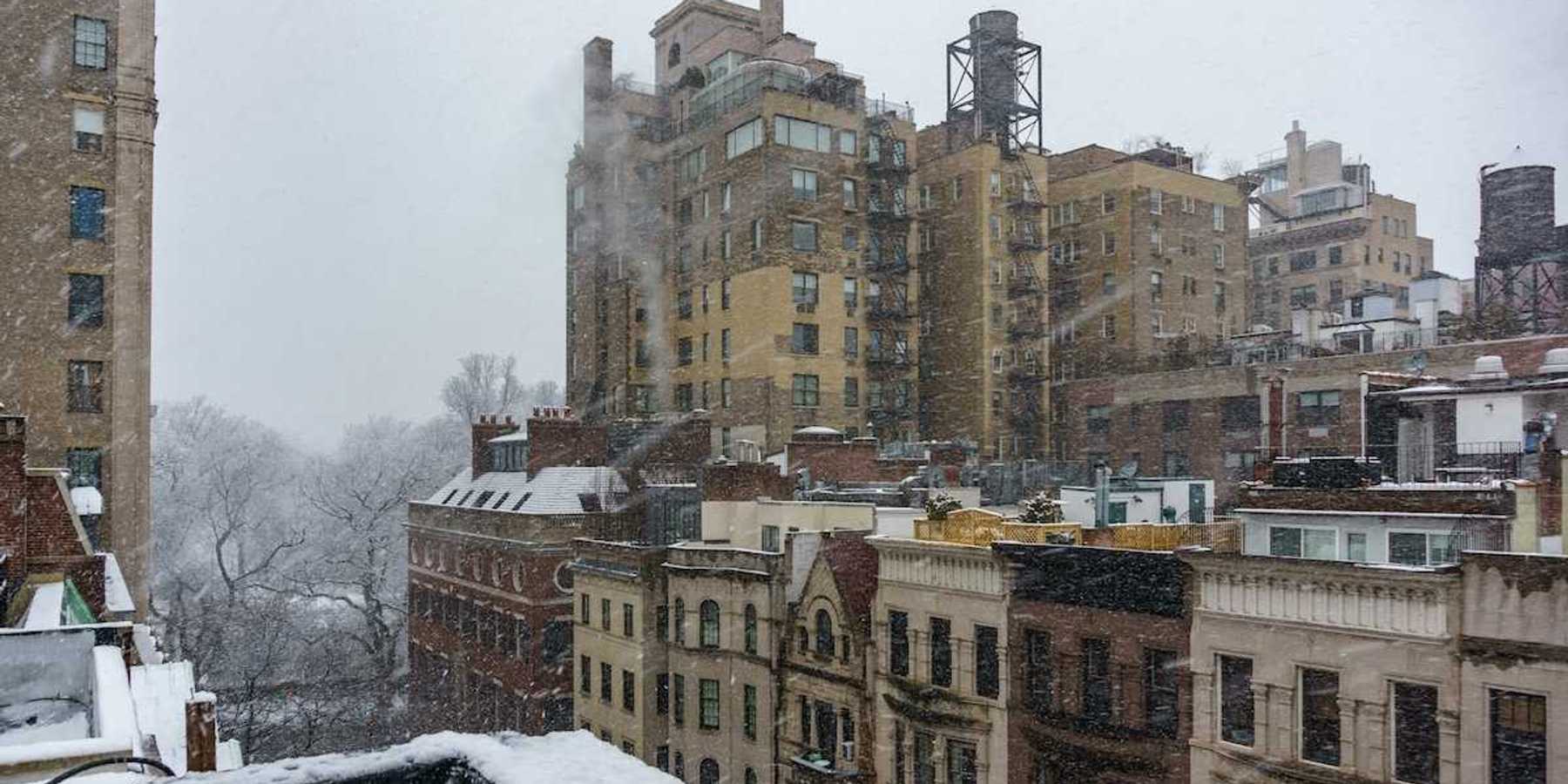 Urban winter scene; tenements at East 94th Street & Madison Avenue, New York, NY, USA