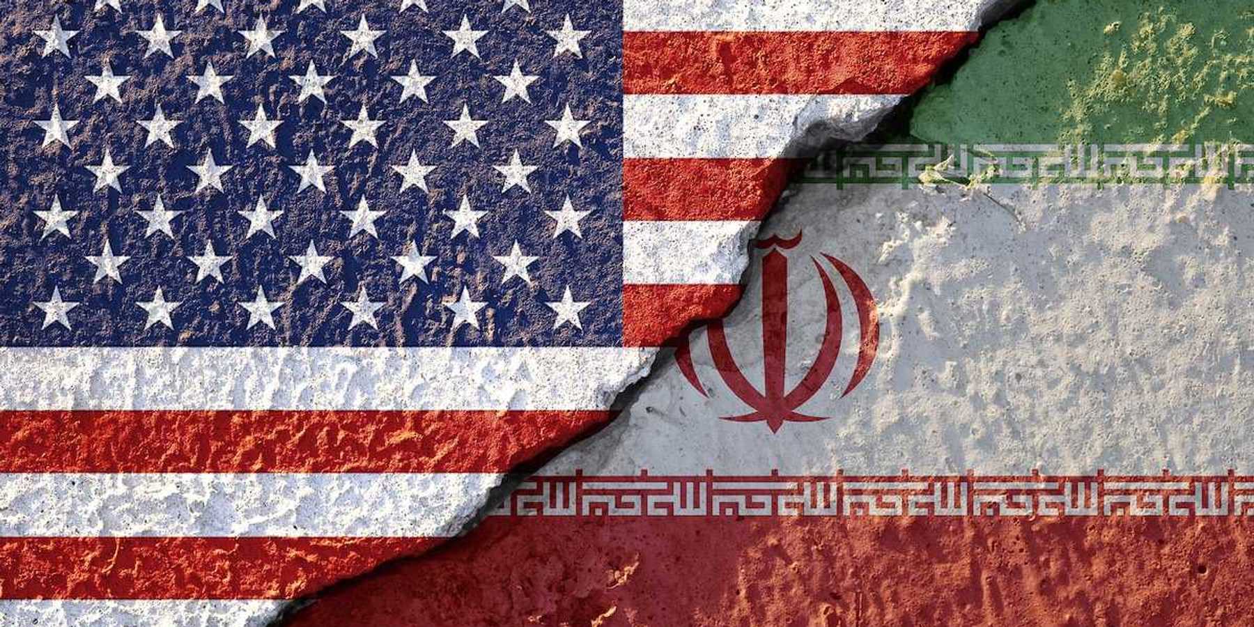 USA flag and Iran flag on cracked wall damage emblematic of USA - Iran War.