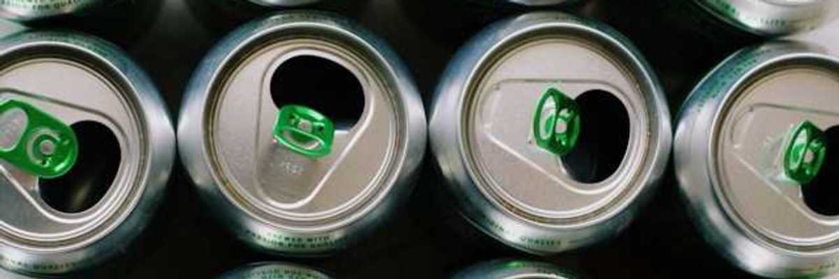 View from a group of aluminum soda cans from above, opened
