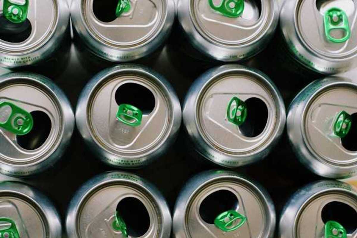 View from a group of aluminum soda cans from above, opened
