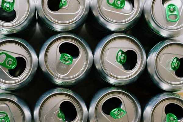 View from a group of aluminum soda cans from above, opened