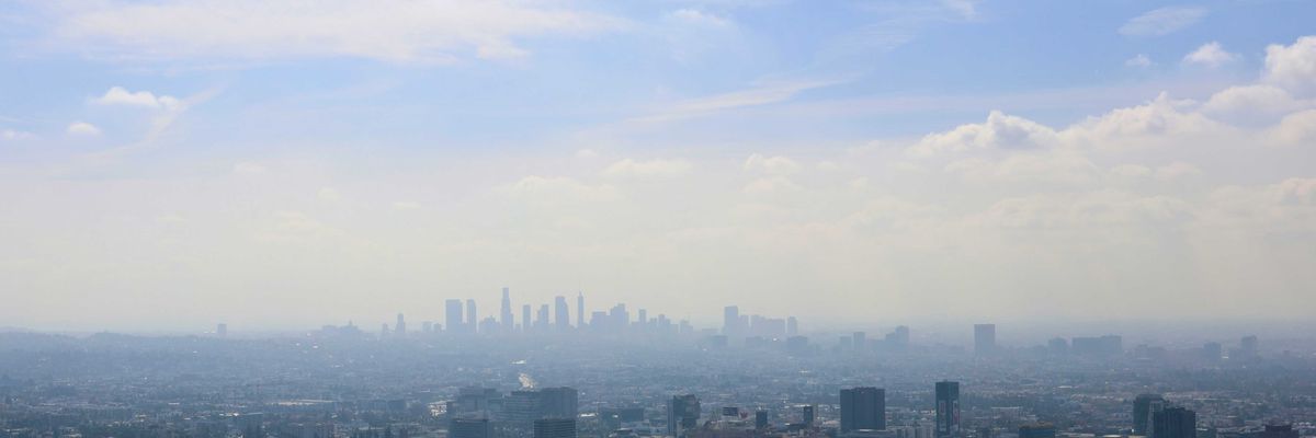 View of Los Angeles skyline shrouded in smog.