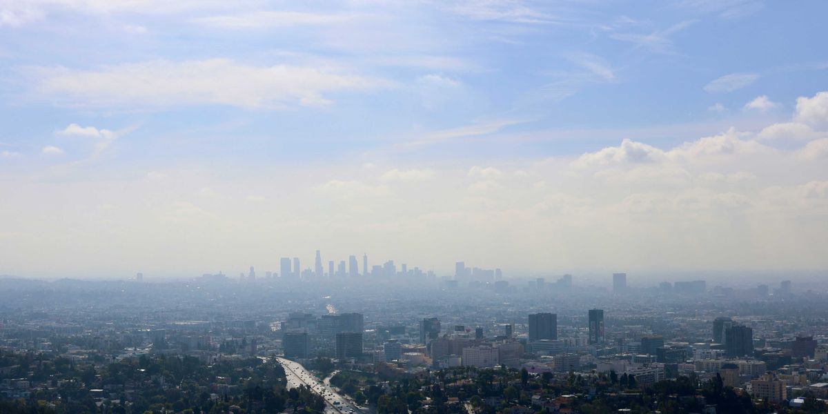 View of Los Angeles skyline shrouded in smog.