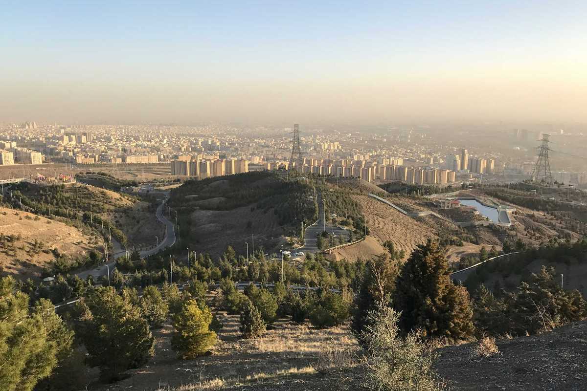 View of Tehran from a hillside with smog in the background