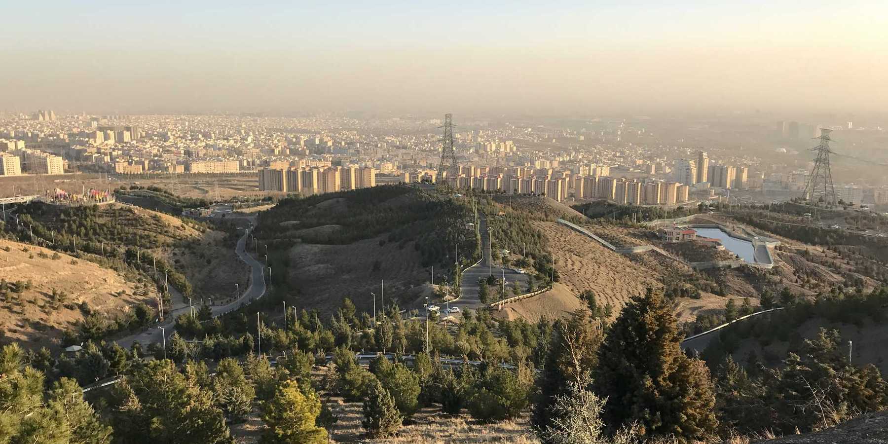 View of Tehran from a hillside with smog in the background