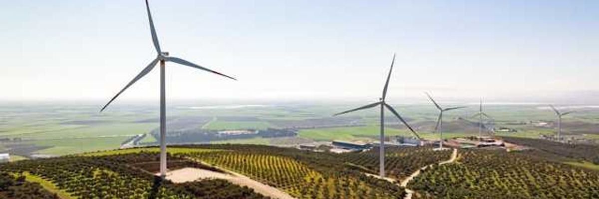View of wind turbines on a hillside