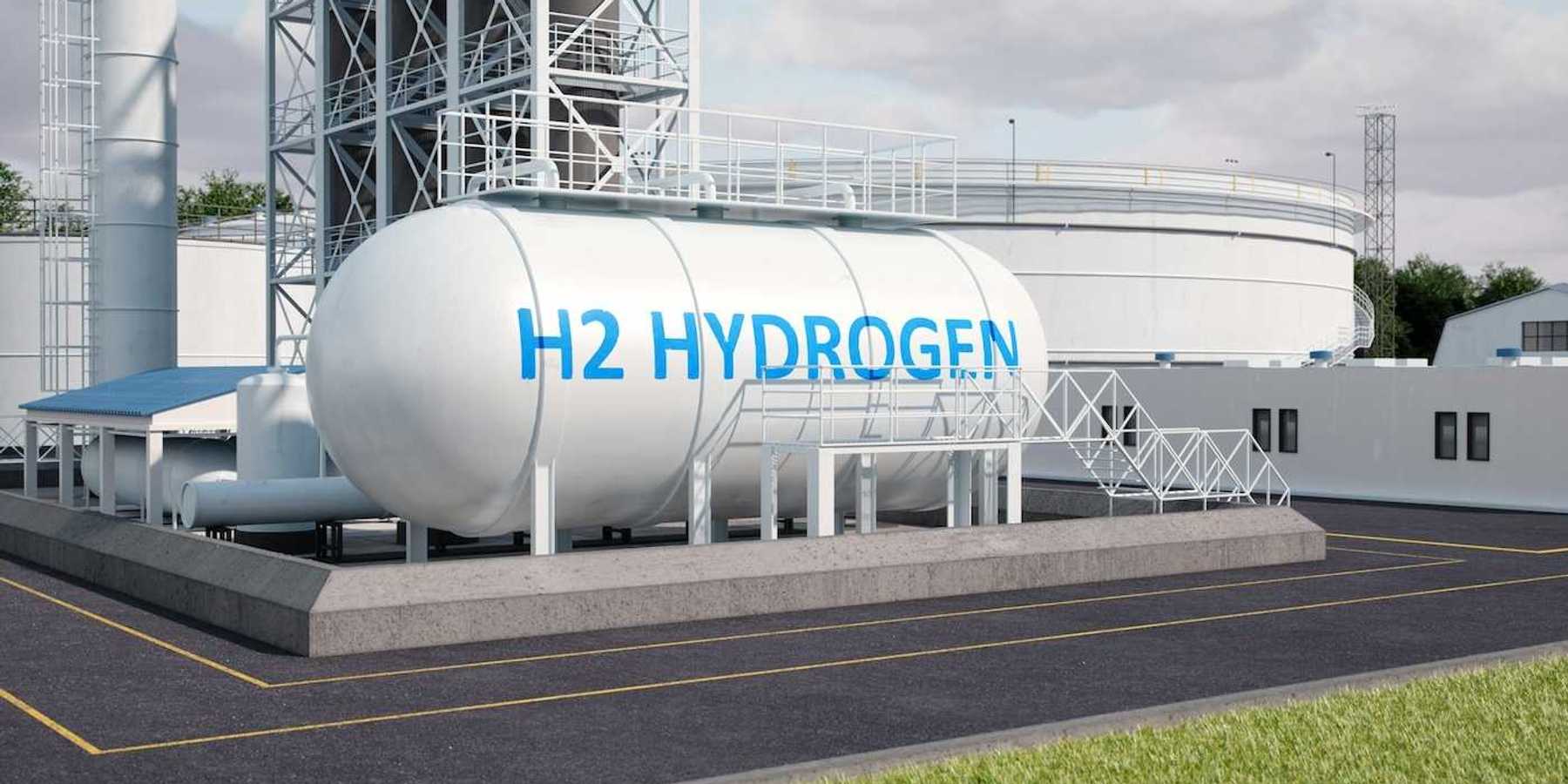 White storage tank lettered "H2 HYDROGEN" in blue letters
