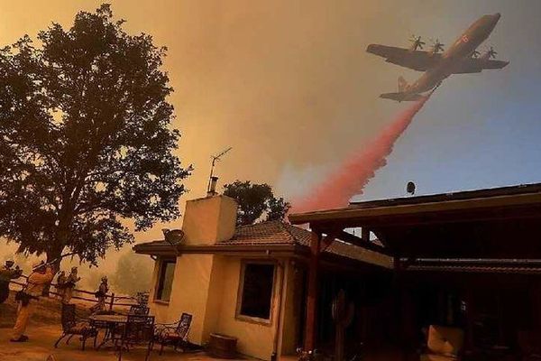 wildfire retardants being sprayed by plane