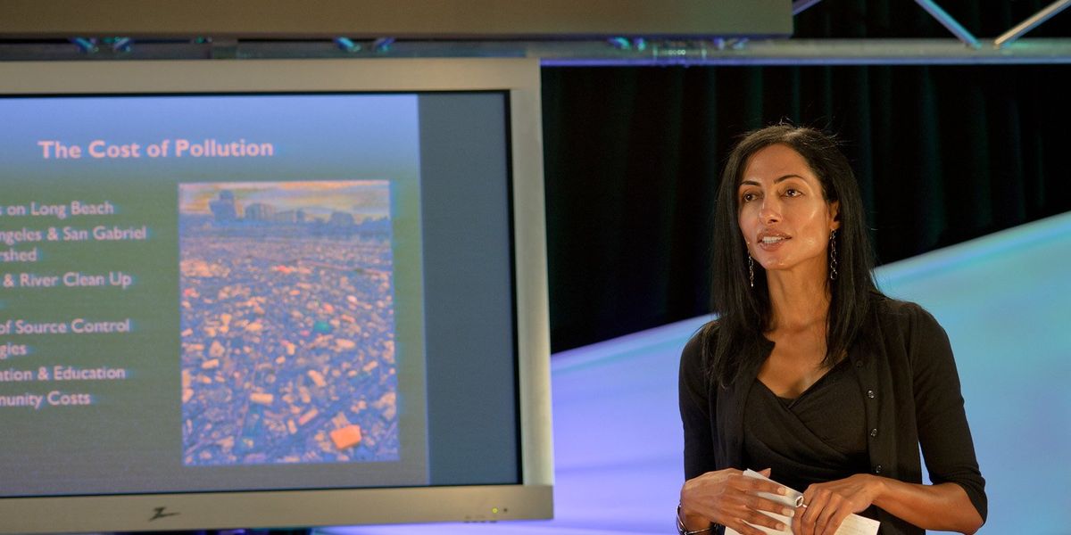 woman presenting on the plastic pollution crisis
