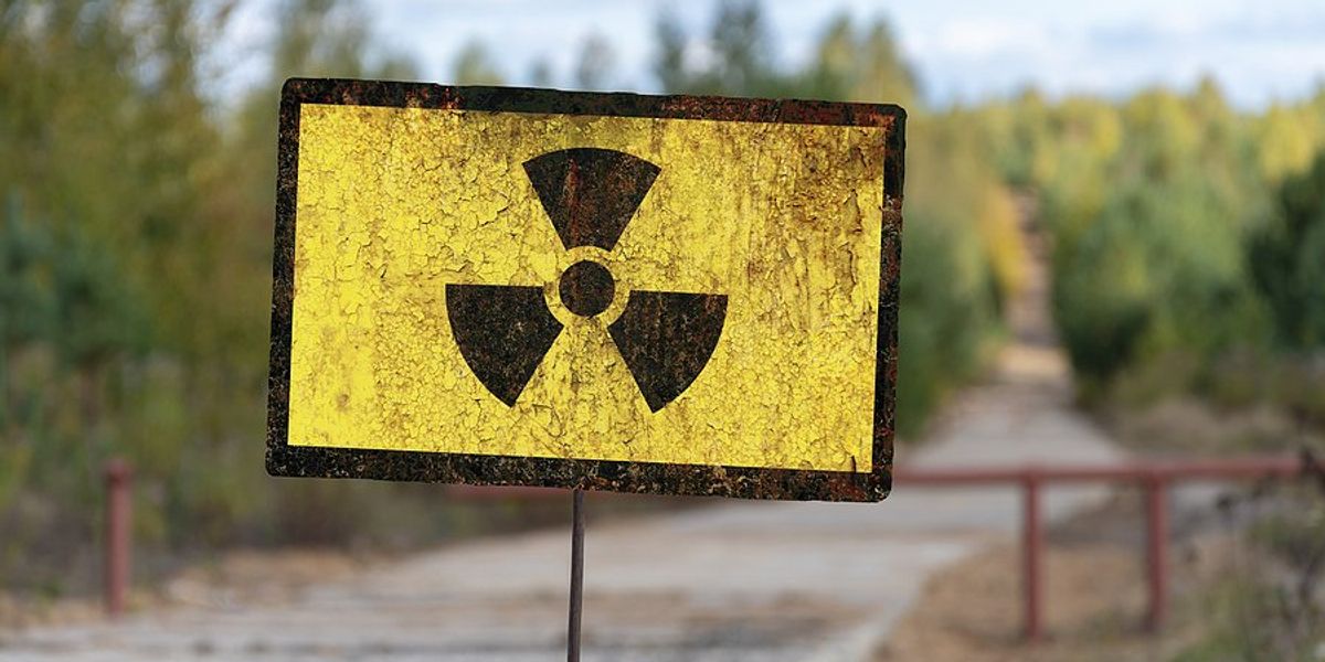 Yellow and black radioactive warning sign.